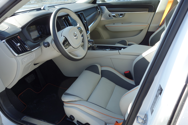 Illustration for article titled The Volvo V90 Cross Country Has Orange Seatbelts and a $3,300 Cargo Box and I Love It
